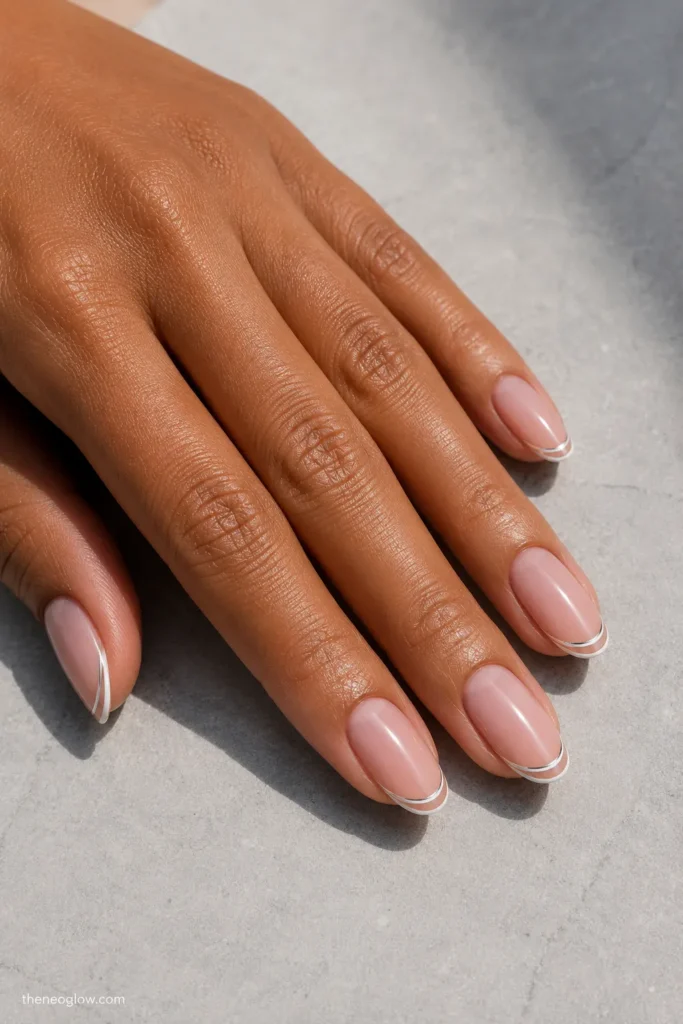 Almond nails with white and silver double French lines