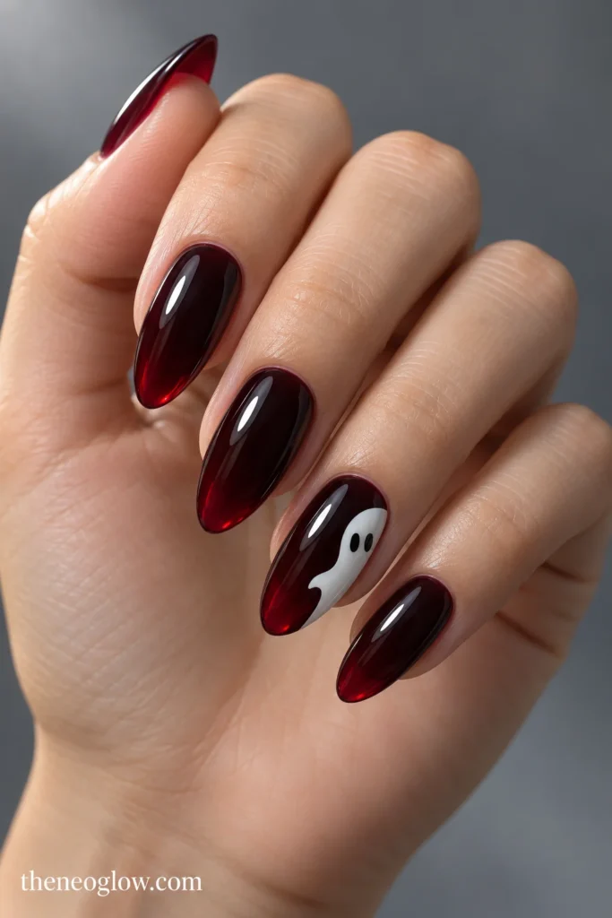 Translucent black-cherry almond acrylics with one opaque-white ghost entering from the ring-nail sidewall.