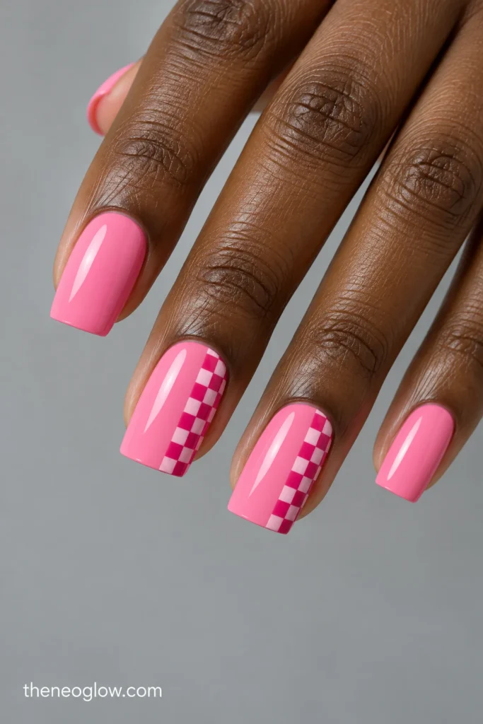 Medium glossy candy-pink square nails with a narrow vertical fuchsia-and-pale-pink checker strip.