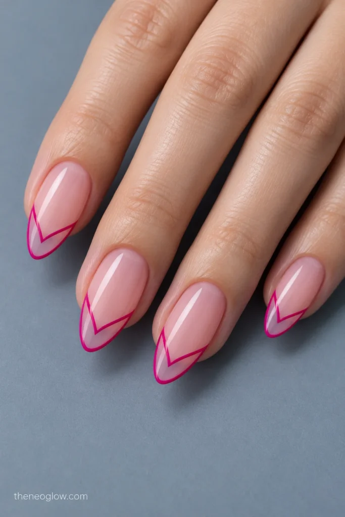 Medium almond nails with fine fuchsia V-shaped French outlines enclosing transparent tip areas.