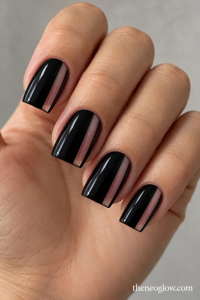 Short square acrylic nails in glossy black with vertical sheer rosy side panels.